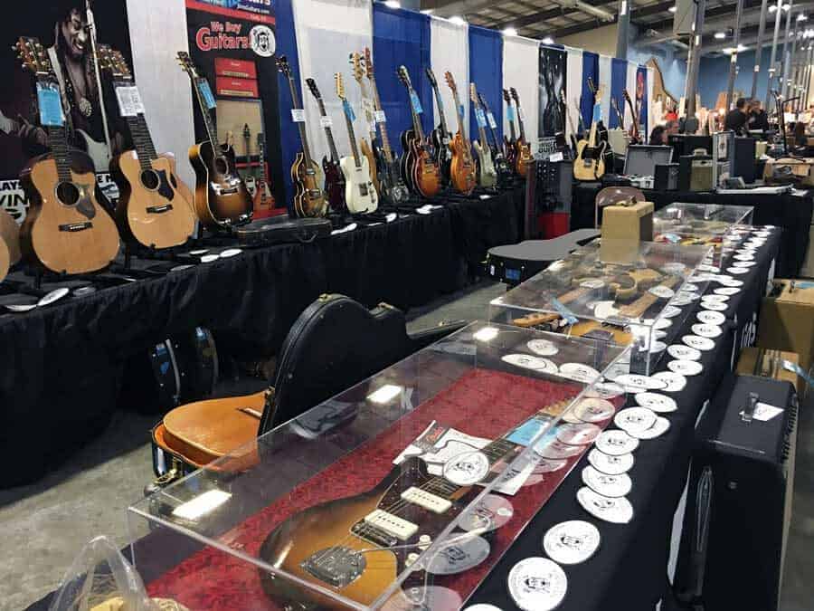 Vintage guitars, vinyl records, and rock memorabilia at Grayslake Antique Market August 10 & 11